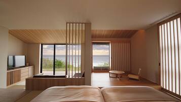 Suite Grand, Terraza, vista al océano | Minibar, caja de seguridad en la habitación y escritorio