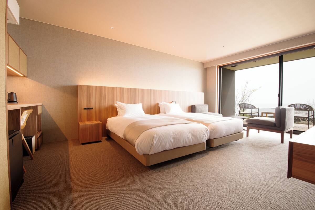 Junior Suite, Ground Floor | Minibar, in-room safe, desk, laptop workspace