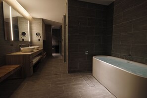 Superior Suite, Terrace, Ground Floor | Bathroom | Separate tub and shower, free toiletries, hair dryer, slippers