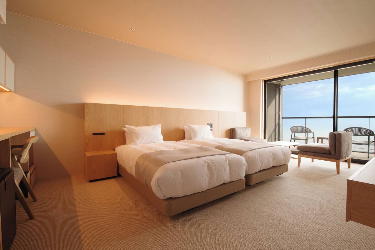 Junior Suite, Ocean View | Minibar, in-room safe, desk, laptop workspace