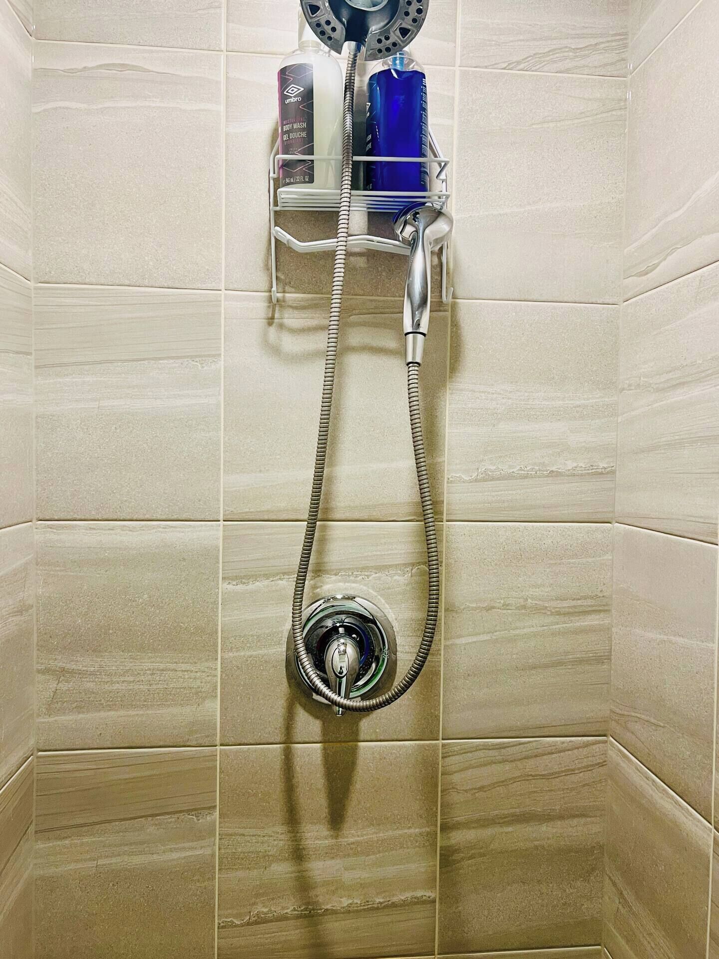Shower, hair dryer, towels, soap