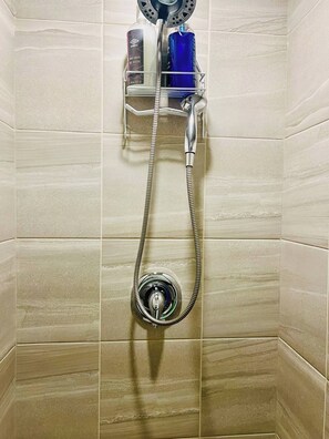Shower, hair dryer, towels, soap