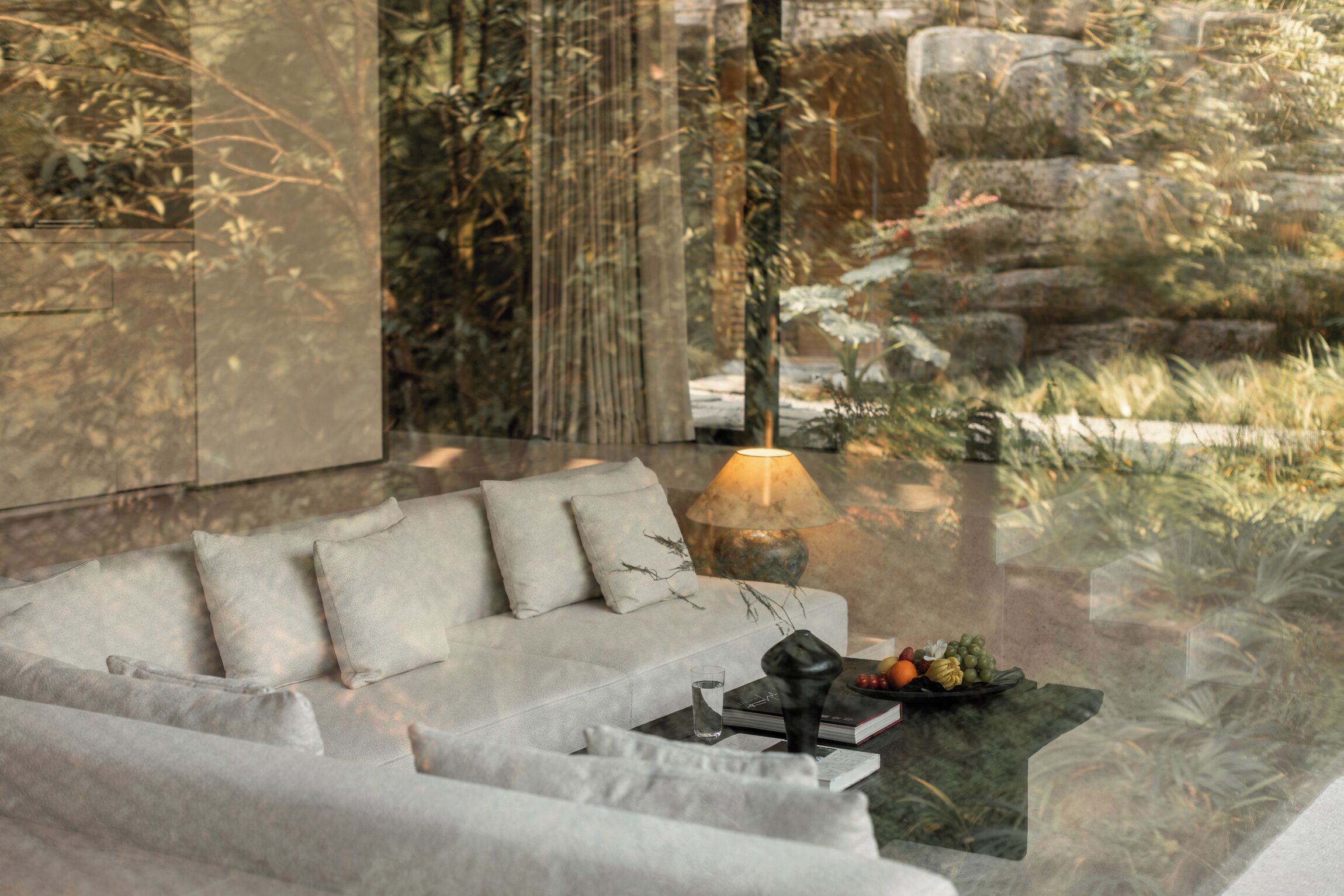 A modern living room with a sofa, a coffee table, and a lamp.