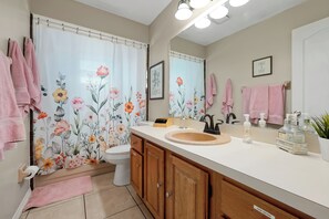 Hair dryer, towels, soap, shampoo