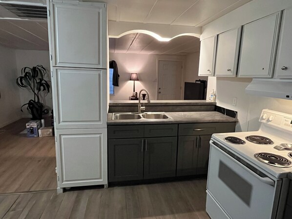 Fridge, microwave, stovetop, coffee/tea maker