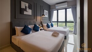 A hotel room with two beds, a ceiling fan, an air conditioning unit, and a large window with curtains. - KIP Core Soho Suite by Five Senses (Sepang)