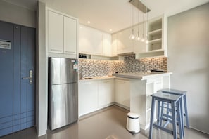Apartamento, sacada | Cozinha privada