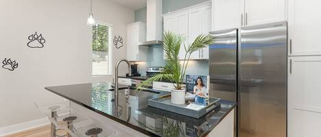 Fridge, dishwasher, coffee/tea maker, ice maker