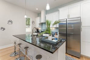 Fridge, dishwasher, coffee/tea maker, ice maker - Unique Uptown Charlotte Oasis | Walk to BOA, Convention Center, & Uptown Attractions | Pet Friendly! (Charlotte)