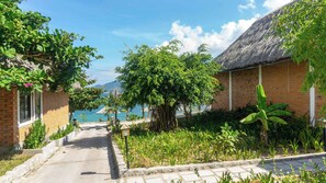 Deluxe Bungalow, Beach View | Terrace/patio