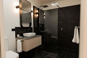 Hair dryer, towels, soap, shampoo