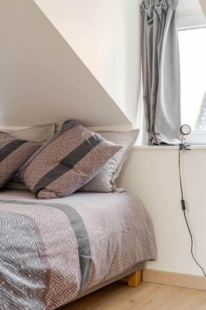 1 slaapkamer, een strijkplank/strijkijzer, wifi, beddengoed