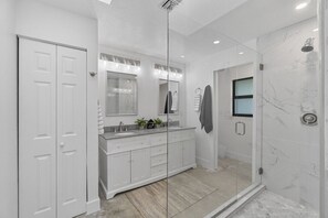 Shower, hair dryer, towels