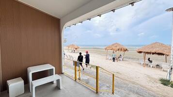 On the beach, white sand