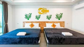 Deluxe Double or Twin Room | Desk, bed sheets