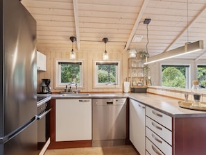 Fridge, microwave, dishwasher, cookware/dishes/utensils