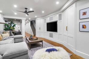 TV, fireplace, books, offices