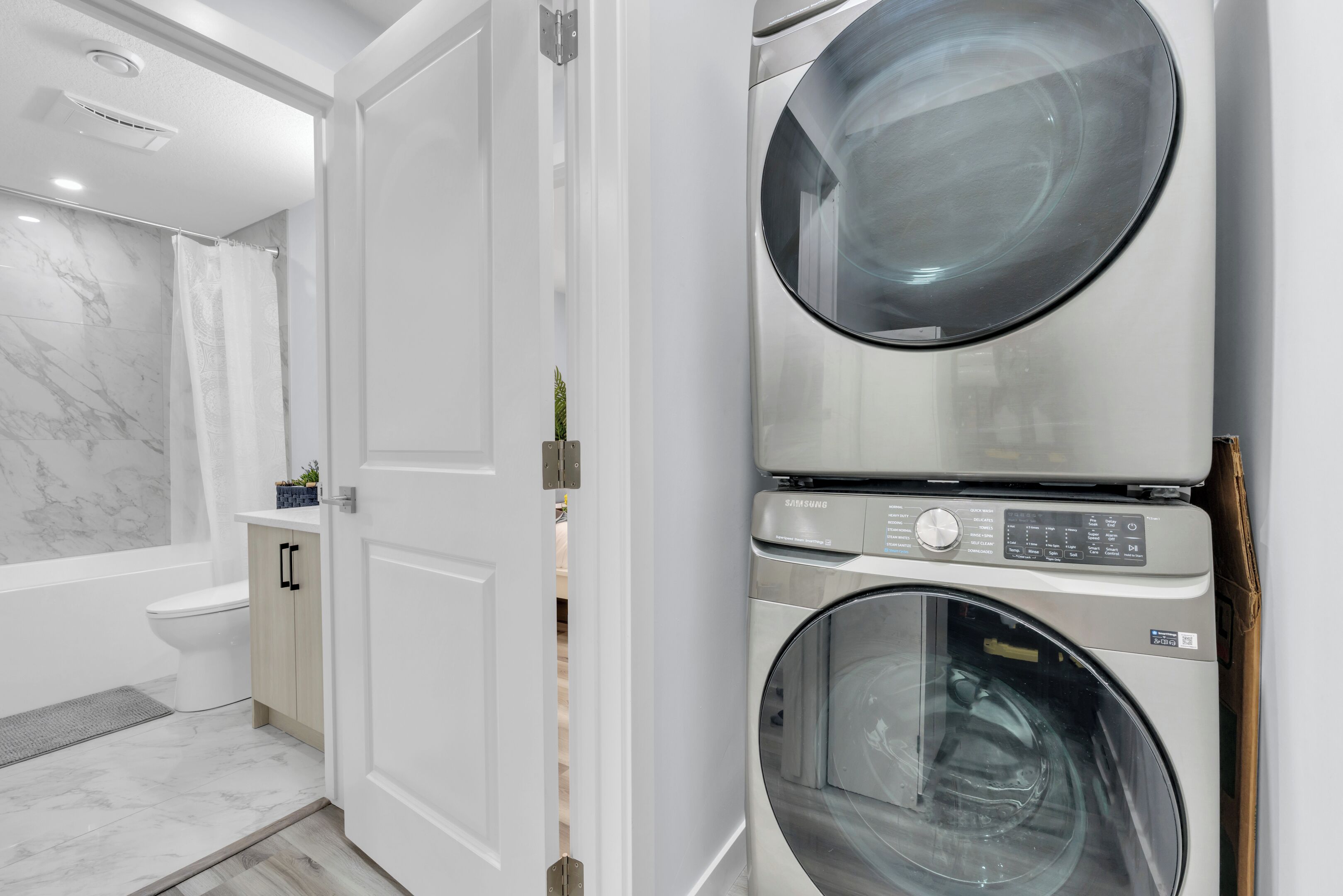 Hair dryer, towels, soap, toilet paper