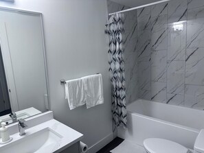 Hair dryer, towels, soap, toilet paper - Enjoy a private 2-bedroom basement suite designed for comfort and convenience. (Edmonton)