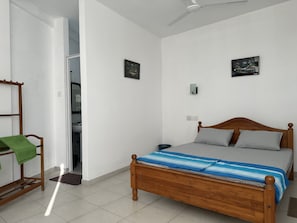 Comfort Apartment, Lagoon View | Desk, laptop workspace, iron/ironing board - Sky Line Guest (Wanchawala)