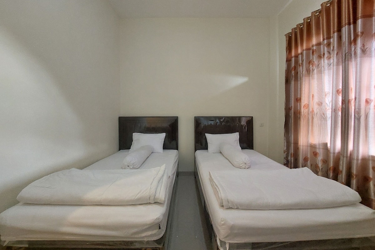Chambre Deluxe avec lits jumeaux, patio, vue jardin | Wi-Fi gratuit