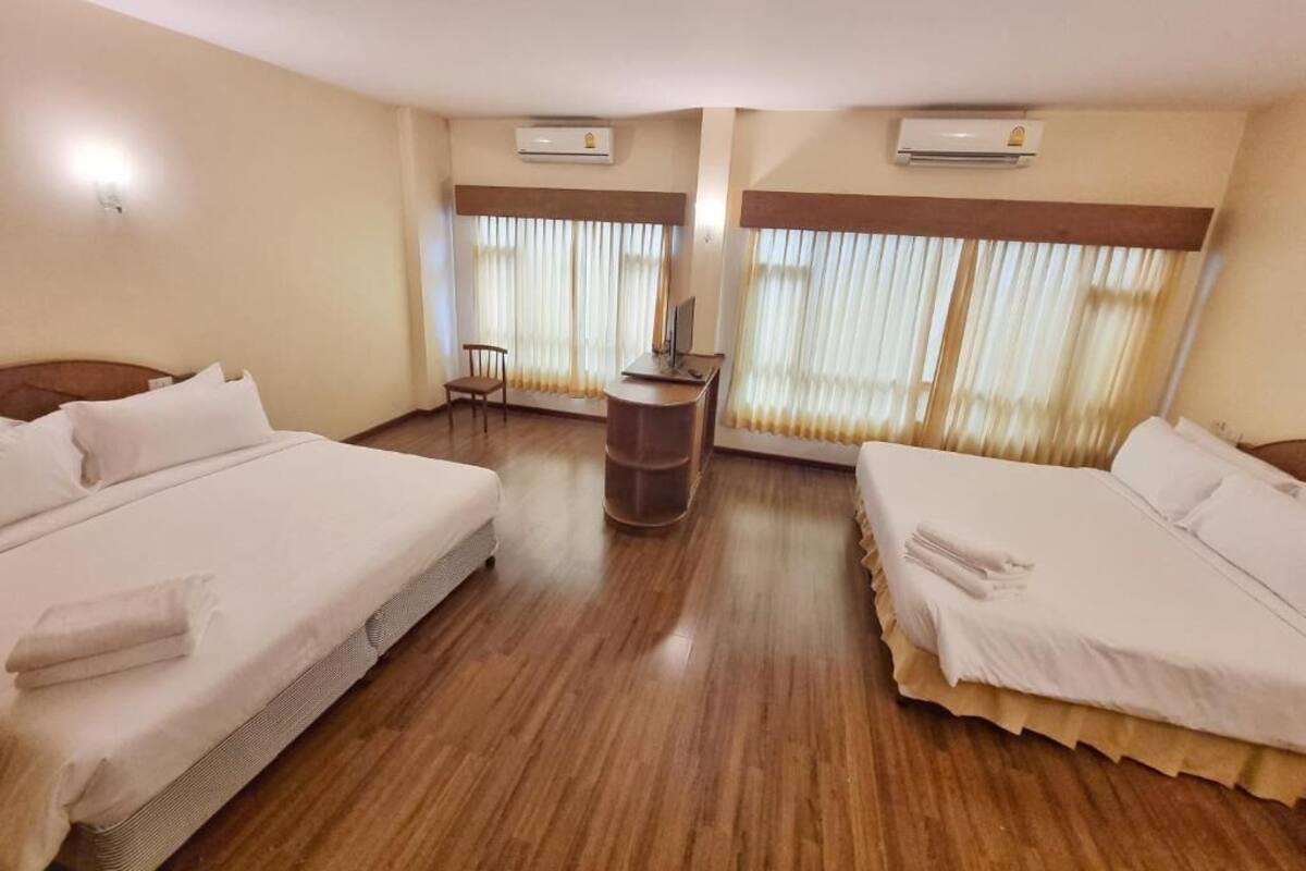 Family Room | Desk, bed sheets