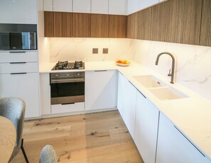 Fridge, oven, coffee/tea maker, toaster