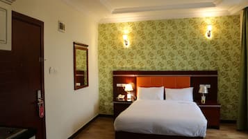 Basic Double Room, City View | In-room safe, laptop workspace, iron/ironing board, free WiFi