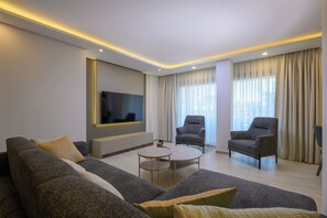 Grand Apartment, 3 Bedrooms, Balcony, Garden View | Living area | 55-inch Smart TV with digital channels - Ayaz Suites (Bodrum)
