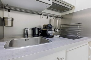 Apartment | Private kitchen | Fridge, microwave, stovetop, dishwasher