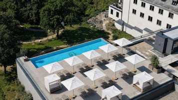 Indoor pool, seasonal outdoor pool, free pool cabanas, pool umbrellas