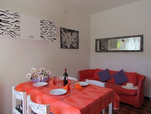 Villa, 2 Bedrooms, Patio, Garden View | Dining room - Villa With Garden and Beach Place (San Michele al Tagliamento)