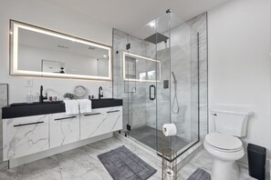 Hair dryer, towels, soap, shampoo