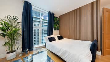 2 habitaciones, tabla de planchar con plancha y cuna de viaje