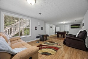 Smart TV, fireplace, video games, foosball