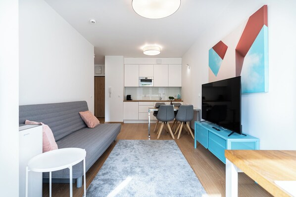 Comfort Apartment, Balcony | Living area
