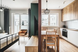 Deluxe Studio, Balcony | Living area | 40-inch Smart TV with cable channels