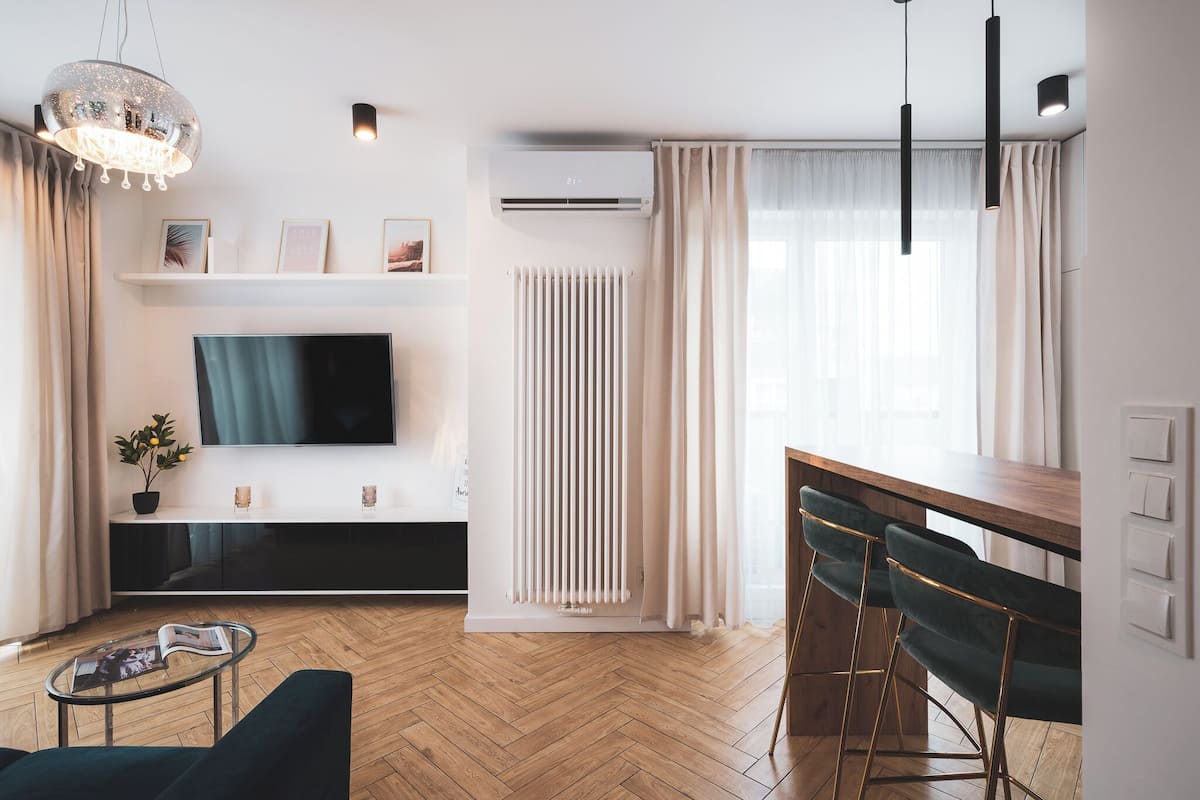 Apartment, Balcony, Courtyard View | Living area | 40-inch Smart TV with cable channels