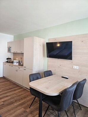 Family Quadruple Room, Balcony | Private kitchen | Highchair