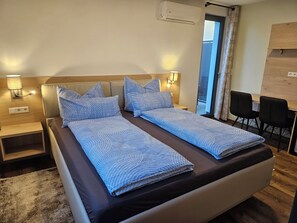Standard Double Room, Balcony | In-room safe, blackout drapes, soundproofing, free WiFi