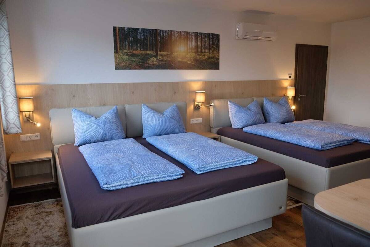 Family Quadruple Room, Balcony | In-room safe, blackout drapes, soundproofing, free WiFi