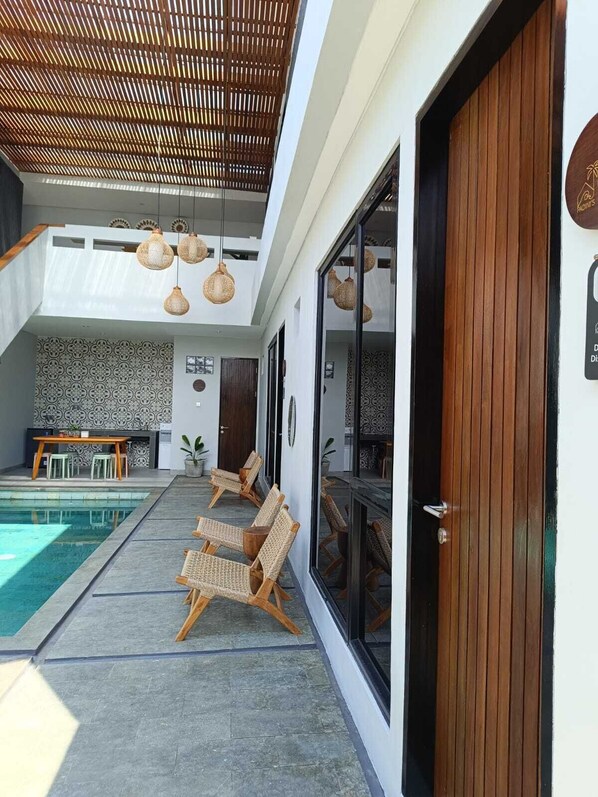 Deluxe Suite, Pool View | View from room - Padinis Villa & Coffee (Batubulan)