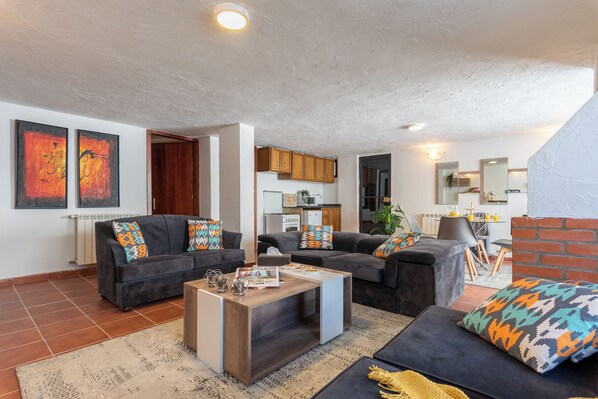 Apartment, City View | Living room | Fireplace