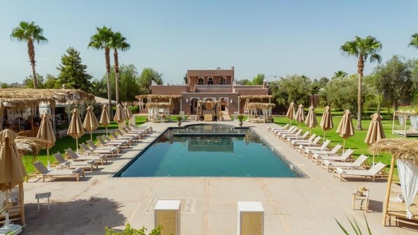 2 outdoor pools, pool umbrellas, pool loungers