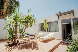 Family Suite, Garden View | Terrace/patio