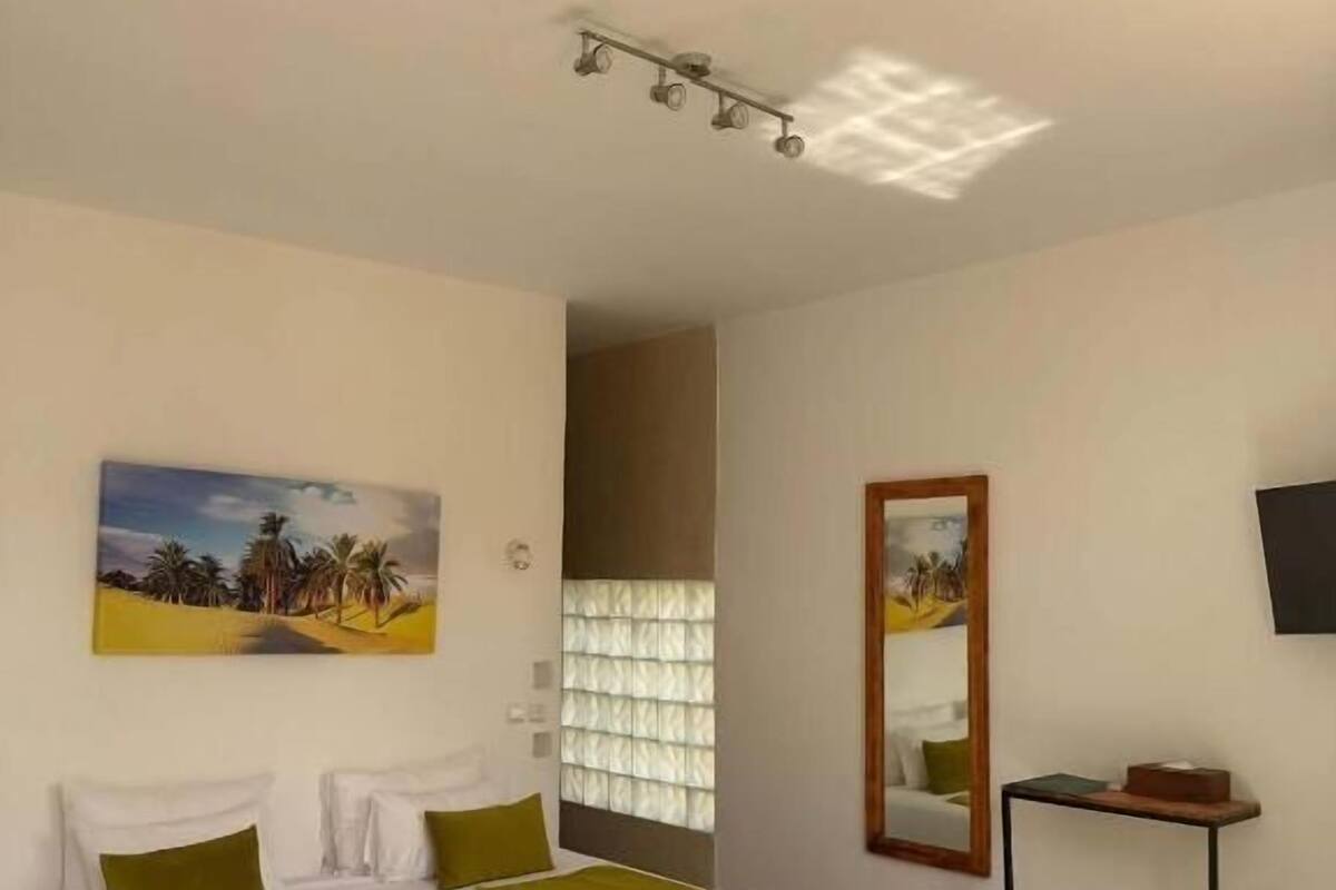 Family Suite, Garden View | In-room safe, free WiFi