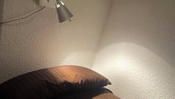 Habitación individual básica | Escritorio, espacio para trabajar con laptop, cunas y wifi gratis