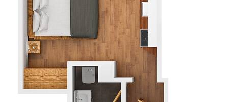 Quarto com uma cama, duas cadeiras, uma mesa pequena, uma escrivaninha e uma cozinha compacta.