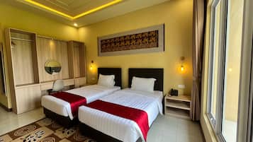 Habitación Deluxe con 1 cama doble o 2 individuales | Escritorio, espacio para trabajar con un portátil, cortinas opacas