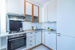 Family Apartment, Multiple Bedrooms (Casa Gialla) | Private kitchen | Fridge, oven, stovetop, dishwasher